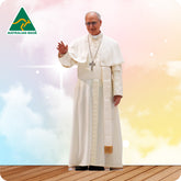 Person in a white robe with a cross pendant on a colorful background with 'Australian Made' logo.